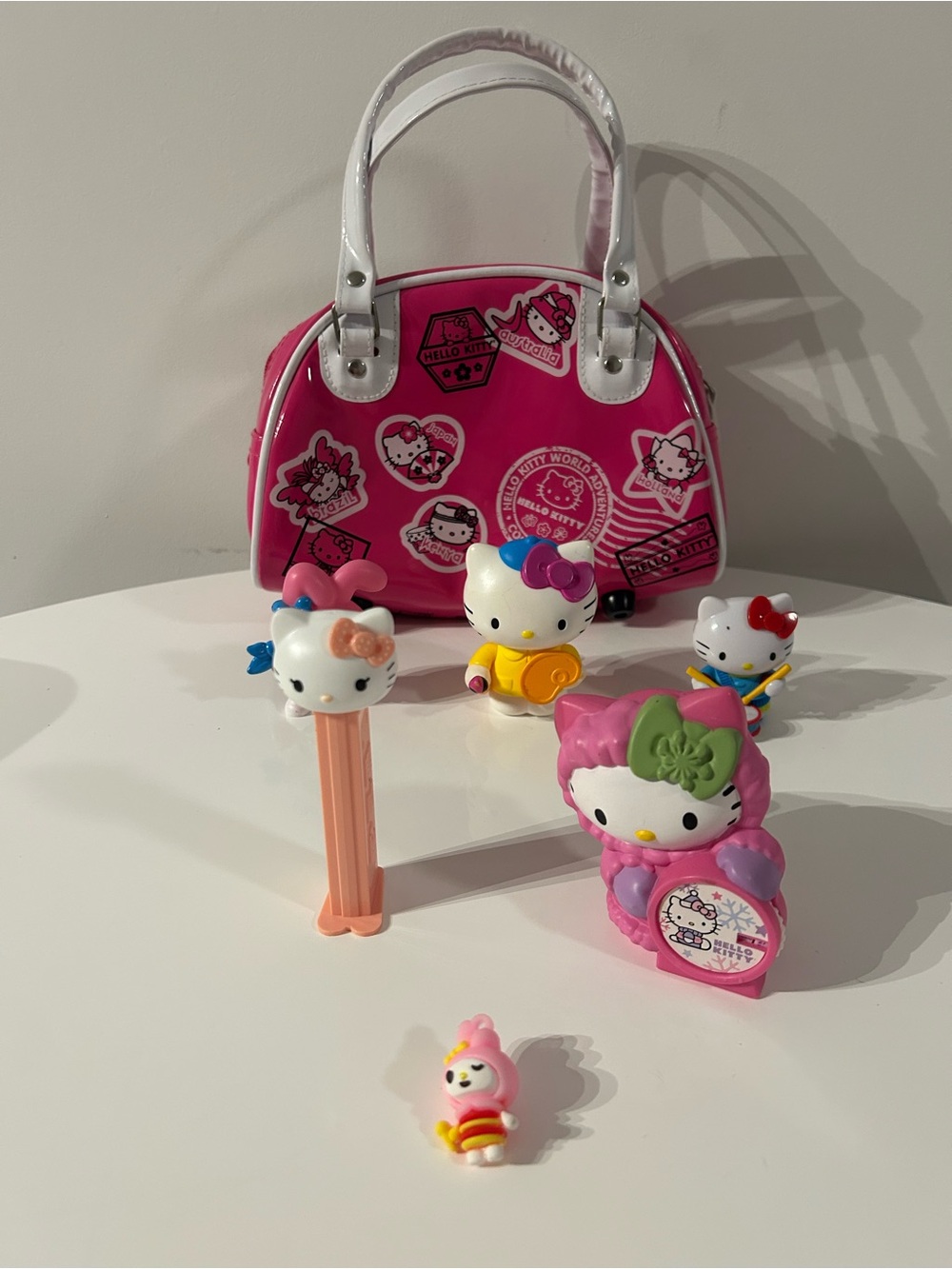 2010 Hello Kitty World Adventures Travel Bag & Sanrio Figure Collectible Lot